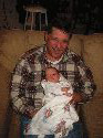Proud Grandpa holding Tyler