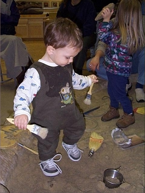 Owen digging for Dinosaur bones