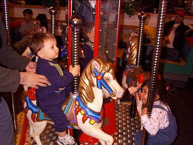 Owen's 1st Carousel ride!