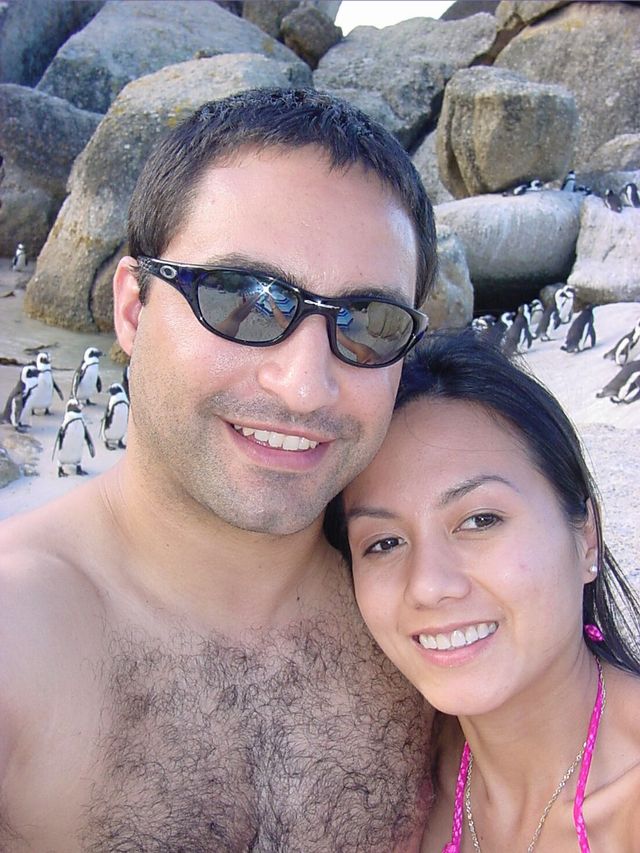 Brett and Jaz at Boulders Beach with Penguins in t