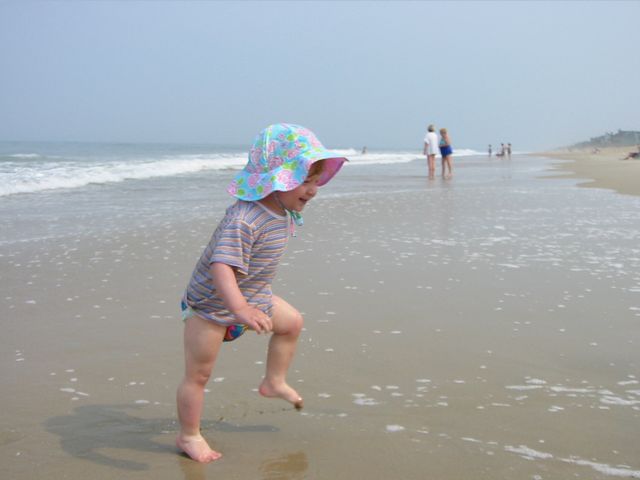 Julie running in the waves