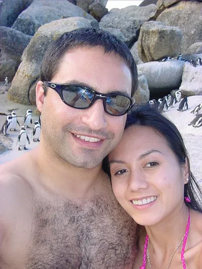 Brett and Jaz at Boulders Beach with Penguins in t