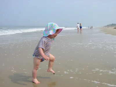 Julie running in the waves
