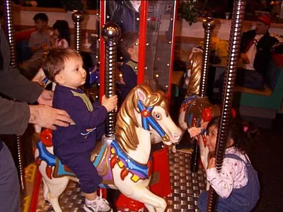 Owen's 1st Carousel ride!