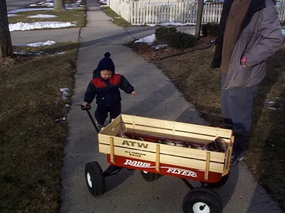 Owen pulling his wagon